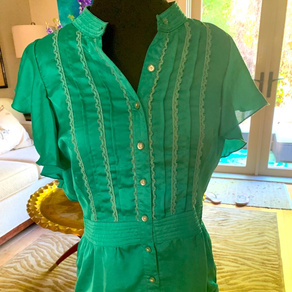 Green silky blouse with ruffles